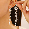Women's Luxury Flower And Leaf Pattern Alloy Electroplated Tassel Long Ear Stud Earrings