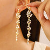 Women's Luxury Flower And Leaf Pattern Alloy Electroplated Tassel Long Ear Stud Earrings