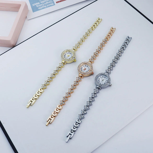 Women's Luxury Round Alloy Bracelet Watch With Rhinestones And Roman Numerals