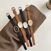 Women's Metal Case Genuine Leather Strap Oval Quartz Watch With Simple Temperament And Light Luxury Design
