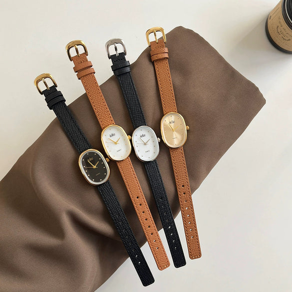 Women's Metal Case Genuine Leather Strap Oval Quartz Watch With Simple Temperament And Light Luxury Design