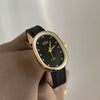 Women's Metal Case Genuine Leather Strap Oval Quartz Watch With Simple Temperament And Light Luxury Design