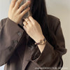 Women's Metal Case Imitation Leather Strap Round Dial Retro Fashion Watch