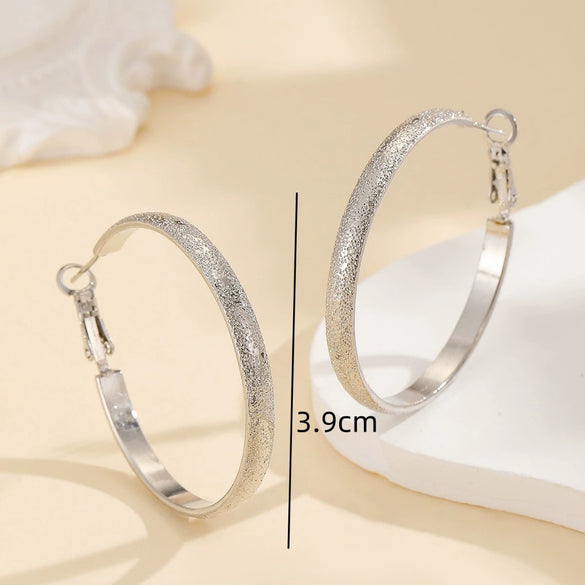 Women's Metal Hoop Earrings With Matte Finish Electroplated Surface And Bold Oversized Circular Design