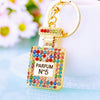 Women's Metal Perfume Bottle Car Key Chain With Diamond Encrusted Bag Pendant Key Chain Ring For Wholesale