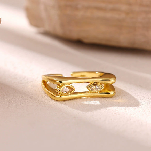 Women's Minimalist Geometric Bow Ring In Goldplated Copper With A Wideface Design And Diamondencrusted Detail