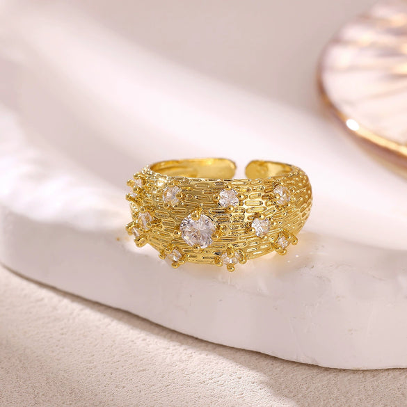 Women's Minimalist Geometric Bow Ring In Goldplated Copper With A Wideface Design And Diamondencrusted Detail