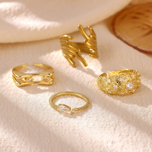 Women's Minimalist Geometric Bow Ring In Goldplated Copper With A Wideface Design And Diamondencrusted Detail