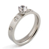 Women's Minimalist Geometric Titanium Steel Rhinestone Inlay Ring Simple Fashion Wedding Band