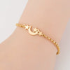 Women's Minimalist Star And Moon Bracelet In Stainless Steel With Gold Inlay Detail