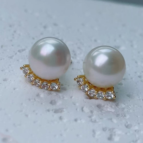 Women's Minimalist Sterling Silver Earrings With Natural And Breeding Freshwater Pearls In Oblate And Flat Round Shapes