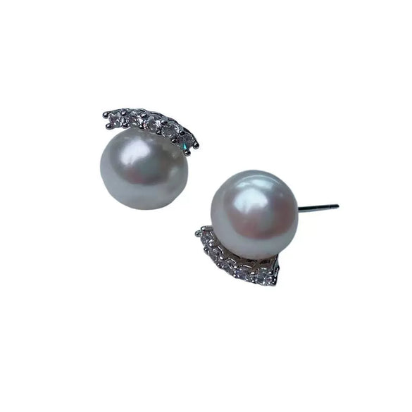 Women's Minimalist Sterling Silver Earrings With Natural And Breeding Freshwater Pearls In Oblate And Flat Round Shapes