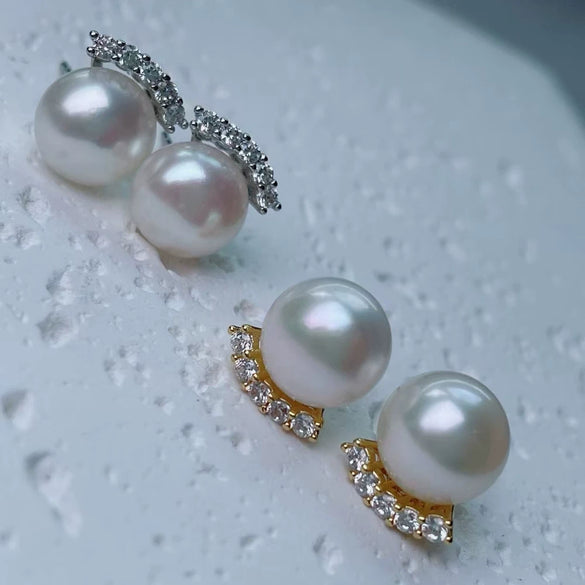 Women's Minimalist Sterling Silver Earrings With Natural And Breeding Freshwater Pearls In Oblate And Flat Round Shapes