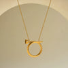 Women's Minimalist Twisted Nail Shaped Stainless Steel Necklace With 18K Vacuum Plated Geometric Pendant