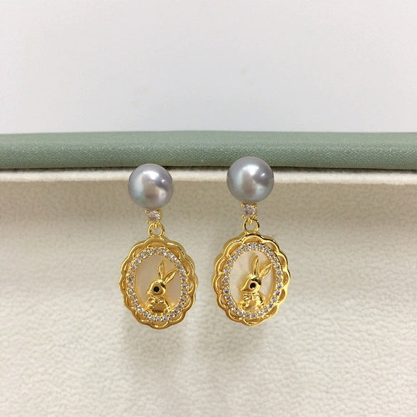 Women's Natural Freshwater Pearl Earrings With S925 Sterling Silver Needle And Sea Shell Bunny Design Oblate Shape