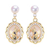 Women's Natural Freshwater Pearl Earrings With S925 Sterling Silver Needle And Sea Shell Bunny Design Oblate Shape