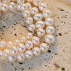 Women's Natural Freshwater Pearl Nearly Round Elastic Bracelet With Silverplated Beads And Highend Design