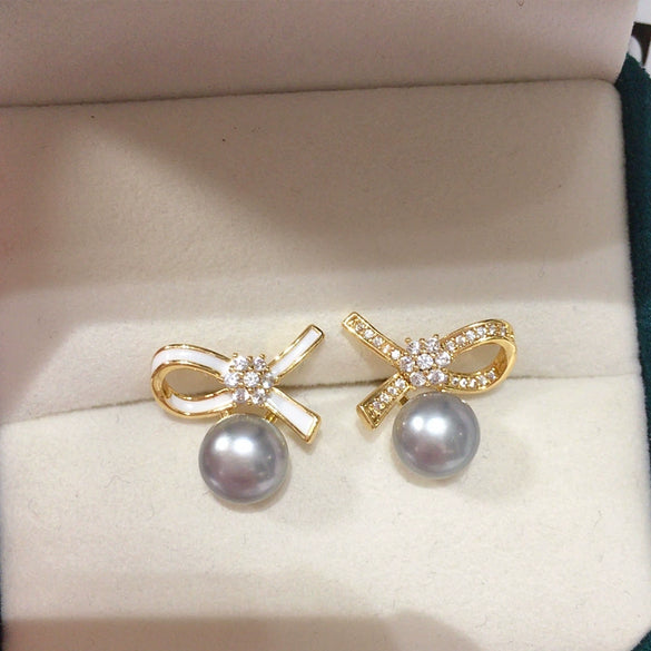 Women's Natural Freshwater Pearl Oblate Bow Earrings