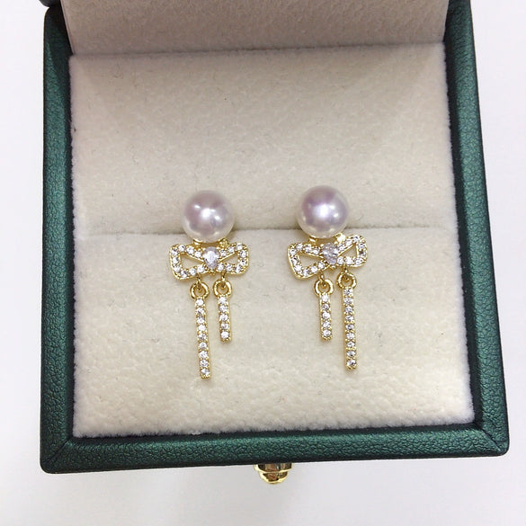 Women's Natural Freshwater Pearl S925 Sterling Silver Earrings With Microinlaid Zircon Bow Tassel And Oblate Shape