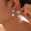 Women's Niche Style Bow Geometric Imitation Pearl Earrings 316L Stainless Steel 18K Gold Plated