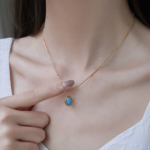 Women's Oval Aquamarine Pendant Necklace In Titanium Steel With Snake Bone Chain And Gold Plated Geometric Clavicle Chain Design