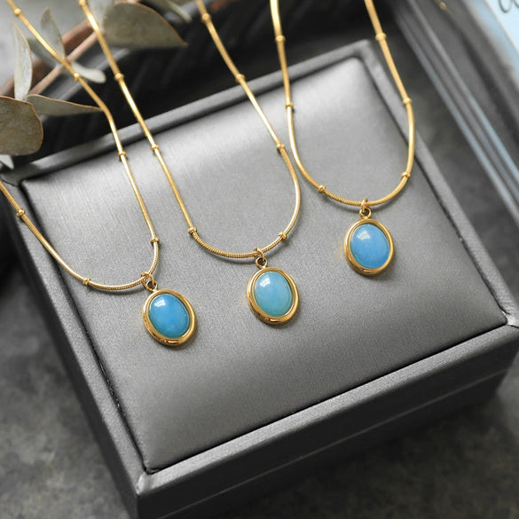Women's Oval Aquamarine Pendant Necklace In Titanium Steel With Snake Bone Chain And Gold Plated Geometric Clavicle Chain Design