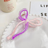 Women's Plastic And Resin Bow Grip Hair Clip With Dripping Oil Design