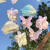 Women's Plastic And Resin Hair Clip With Butterfly And Egg Flower Design And Uv Plating