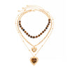 Women's Retro Amber Tiger's Eye Beaded Necklace With Plated Alloy Heart Pendant And Layered Geometric Design