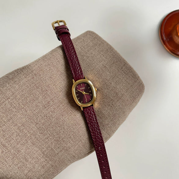 Women's Retro Fashionable Metal Leather Watch With Round Dial And Spiral Crown