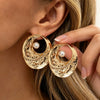 Women's Retro Geometric Oval Hollow Alloy Stud Earrings With Faux Pearls And Rhinestone Details Electroplated Finish And Stainless Steel Posts