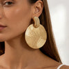 Women's Retro Geometric Round Metal Stud Earrings With Textured Embossed Gold Plating And Bold Statement Design