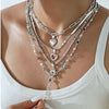 Women's Retro Heart Pendant Necklace With Snake Bone Sweater Chain Layered Long Tassel Design And Electroplated Zinc Alloy Finish