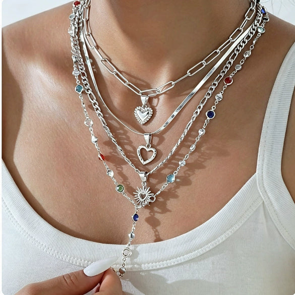 Women's Retro Heart Pendant Necklace With Snake Bone Sweater Chain Layered Long Tassel Design And Electroplated Zinc Alloy Finish