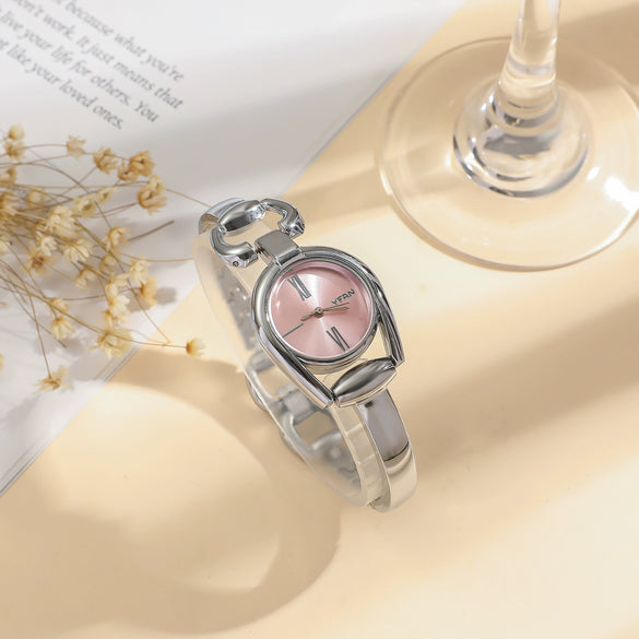 Women's Retro Leisure Alloy Case Stainless Steel Band Round Dial Quartz Watch With Roman Scale And Aurora Hollow Design