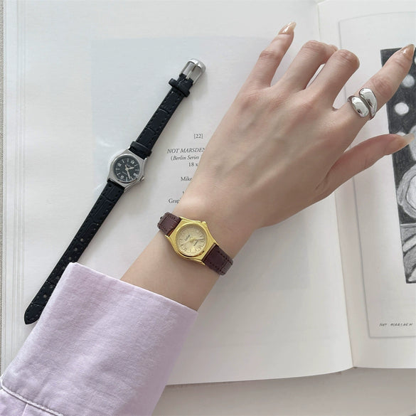 Women's Retro Leisure Metal Case Genuine Leather Strap Round Dial Quartz Watch