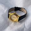 Women's Retro Leisure Metal Case Genuine Leather Strap Round Dial Quartz Watch