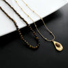 Women's Retro Light Luxury Titanium Steel Tiger Eye Necklace With Geometric Pattern And Electroplating Treatment And Pearl Chain
