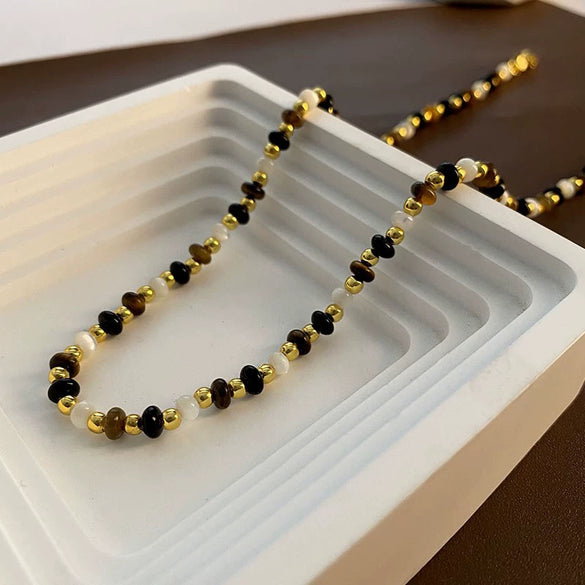Women's Retro Light Luxury Titanium Steel Tiger Eye Necklace With Geometric Pattern And Electroplating Treatment And Pearl Chain