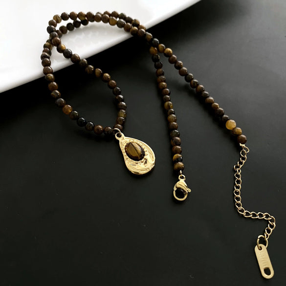 Women's Retro Light Luxury Titanium Steel Tiger Eye Necklace With Geometric Pattern And Electroplating Treatment And Pearl Chain