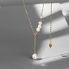 Women's Silver Geometric Imitation Pearl Pendant Necklace With Tassel Detail Cross Chain And Electroplated Light Luxury Design