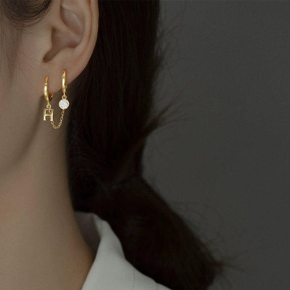 Women's Silver Letter H Double Piercing Earrings With Electroplated Finish And Minimalist Design