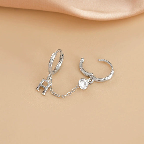 Women's Silver Letter H Double Piercing Earrings With Electroplated Finish And Minimalist Design