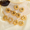 Women's Simple Geometric Circle Stainless Steel Ear Clips With Hollow Design And 18K Gold Vacuum Electroplating
