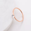 Women's Simple Geometric Titanium Steel Single Stone Ring With Four Claw Setting And Rose Gold Electroplated Finish