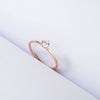 Women's Simple Geometric Titanium Steel Single Stone Ring With Four Claw Setting And Rose Gold Electroplated Finish