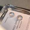 Women's Simple Geometric Wavy Round Hoop Earrings In S925 Sterling Silver With Zircon Diamond Inlay
