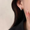 Women's Simple Geometric Wavy Round Hoop Earrings In S925 Sterling Silver With Zircon Diamond Inlay