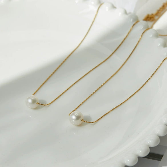 Women's Simple Natural Pearl Smile Necklace With Titanium Steel Snake Bone Chain And Electroplated Gold Color Finish