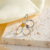 Women's Stainless Steel Adjustable Ring With Gold Silver Color Block Hollow Flower Geometric Design And 18K Vacuum Plated Finish